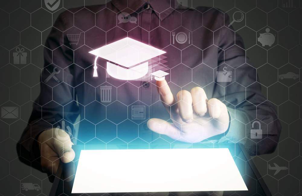 Virtual image of graduate touching graduation cap