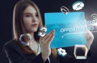 Internet and technology-focused image of a businesswoman holding a futuristic tablet.